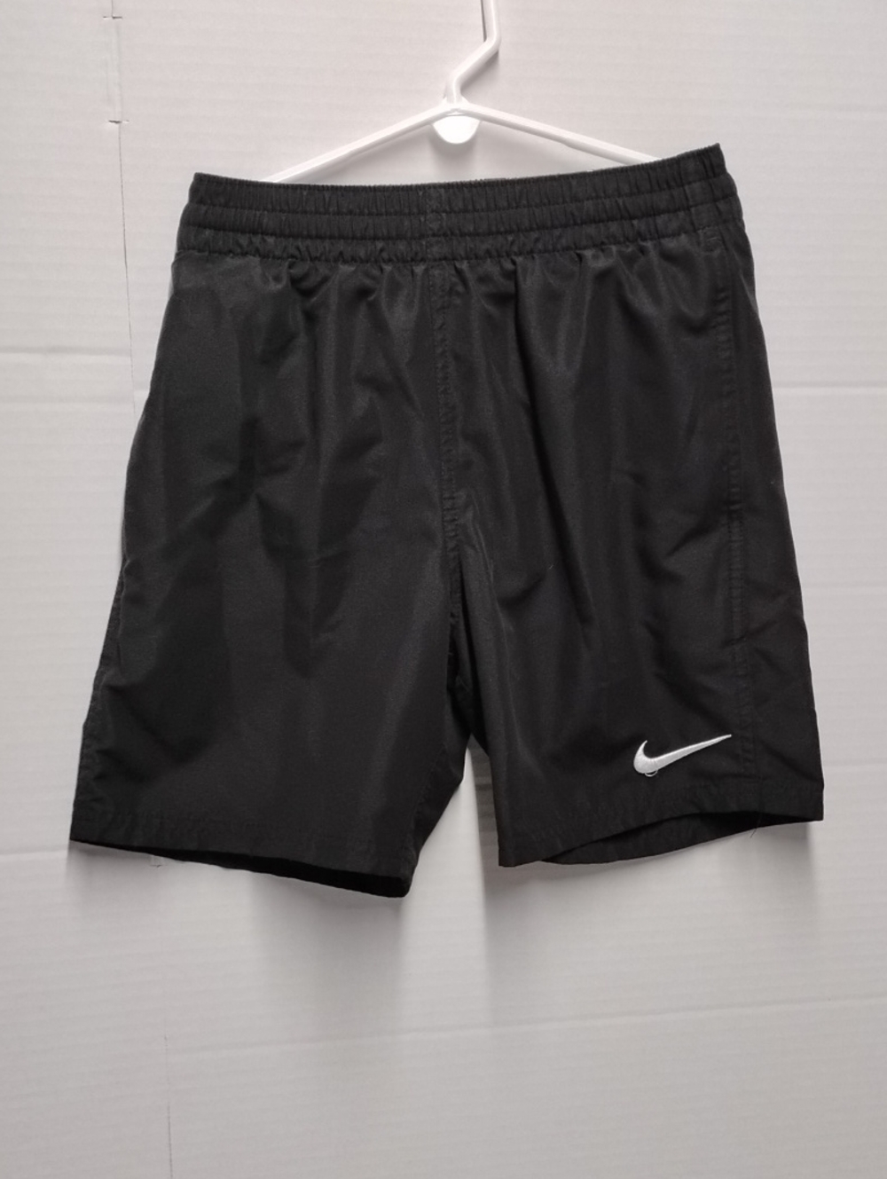 Nike Black Athletic Shorts with White Swoosh Accent